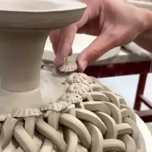 Iconic woven basket with foot