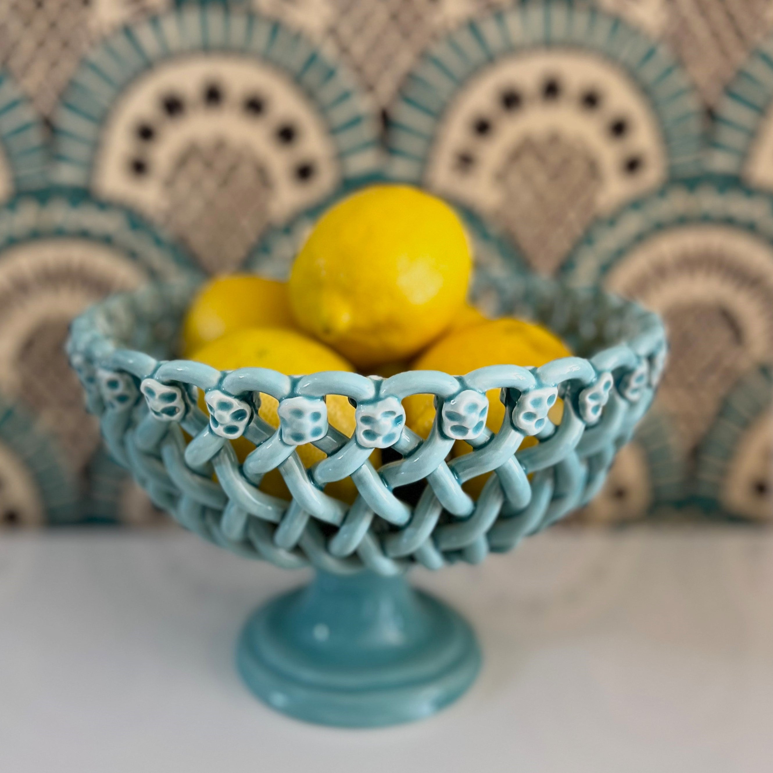 Iconic woven basket with foot