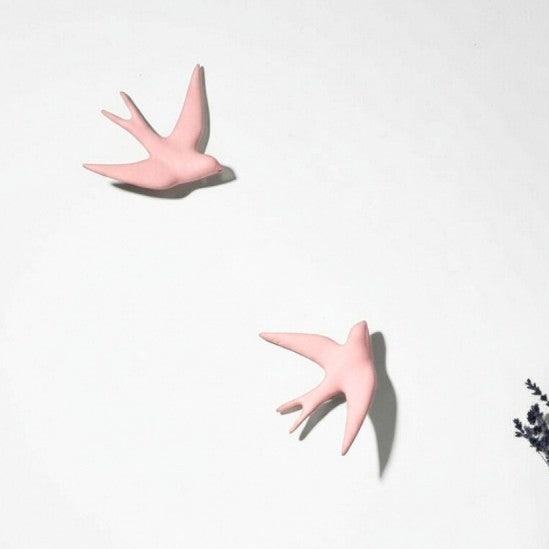 Volage hirondelle en céramique