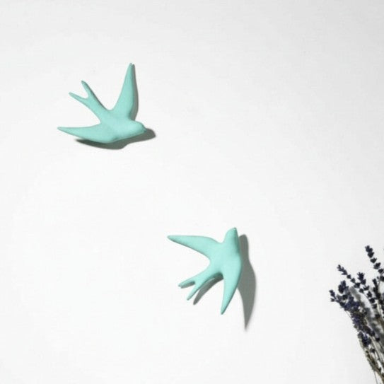 Volage hirondelle en céramique