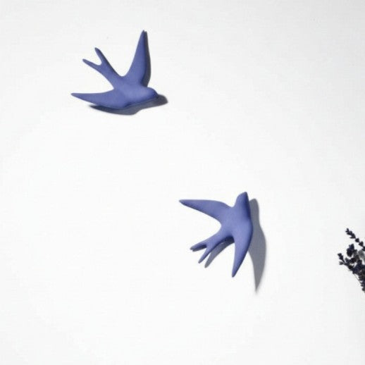Volage hirondelle en céramique