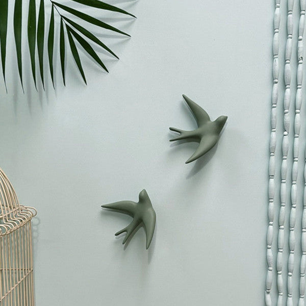 Volage hirondelle en céramique