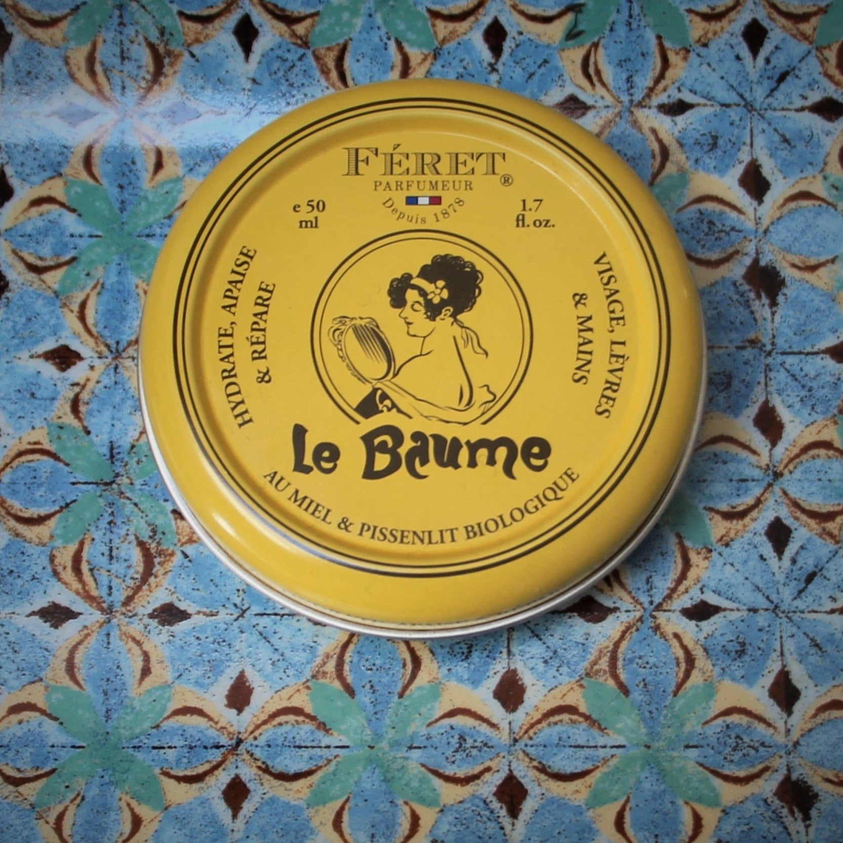 Le baume parfum rose FERET Parfumeur soin cosmétique bio 100% français et écoresponsable.